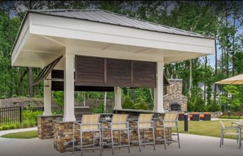 Lullwater at blair stone |poolside outdoor kitchen & fireplace